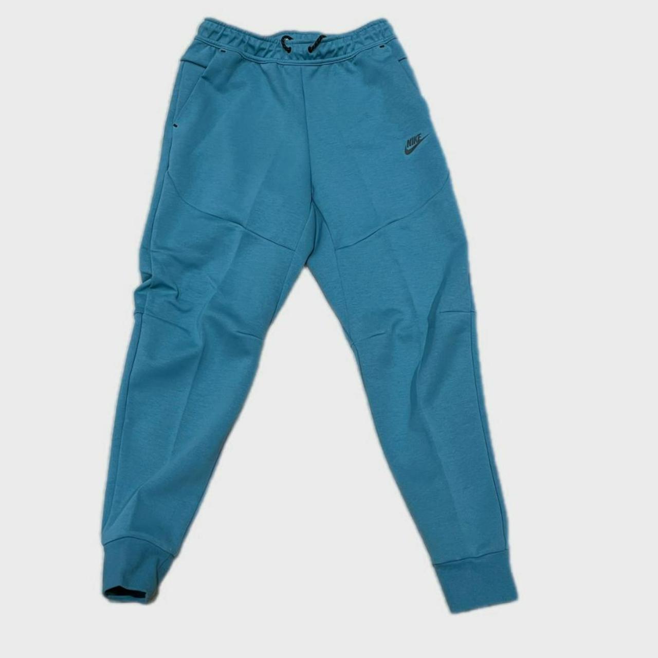 nike tech fleece stone blue joggers