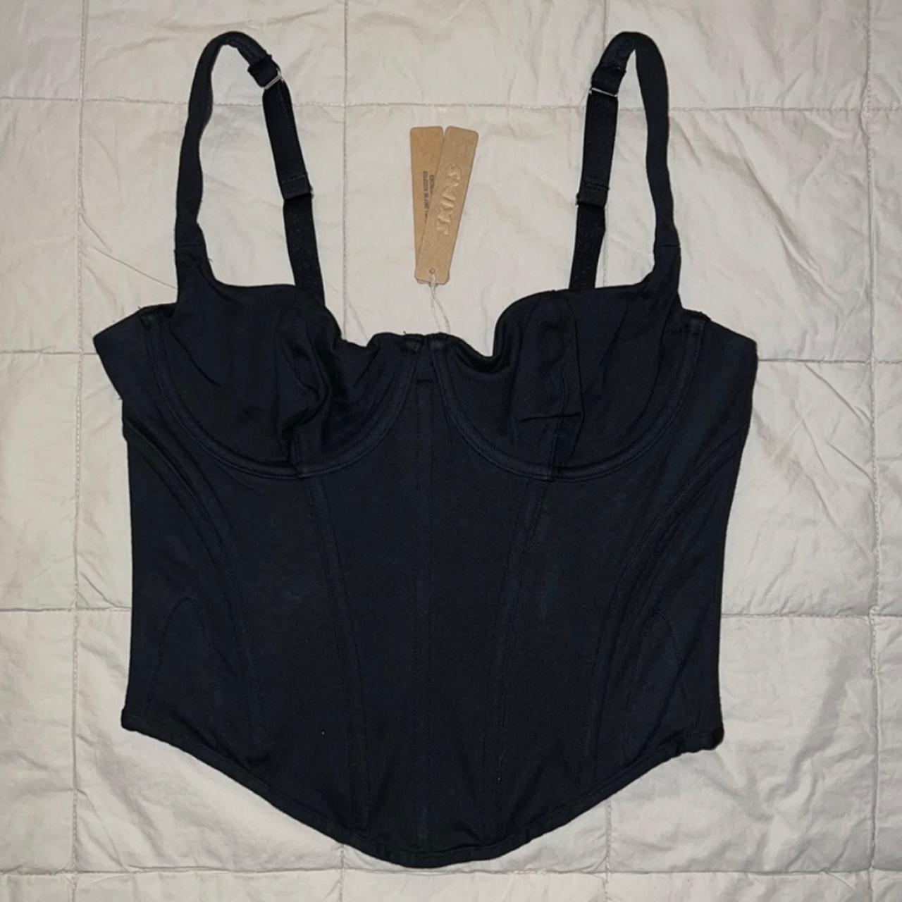Skims cotton corset top. Color is black and it’s a