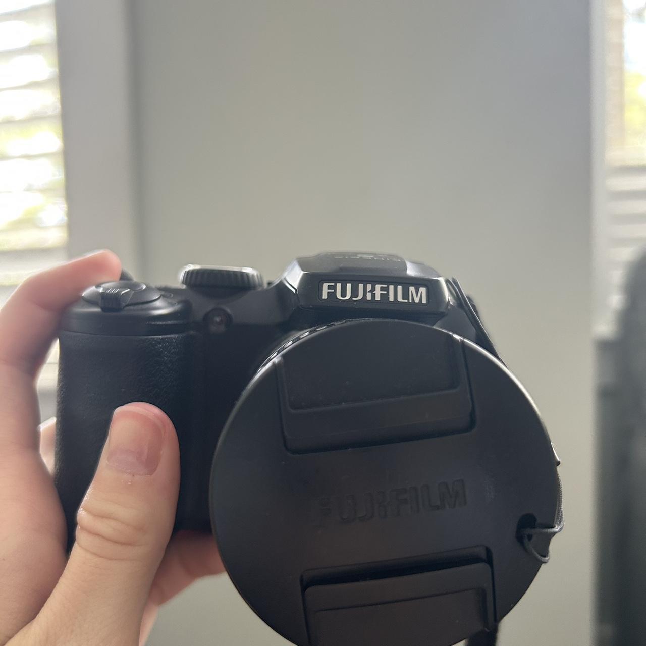 Fuji film camera works just needs batteries - Depop