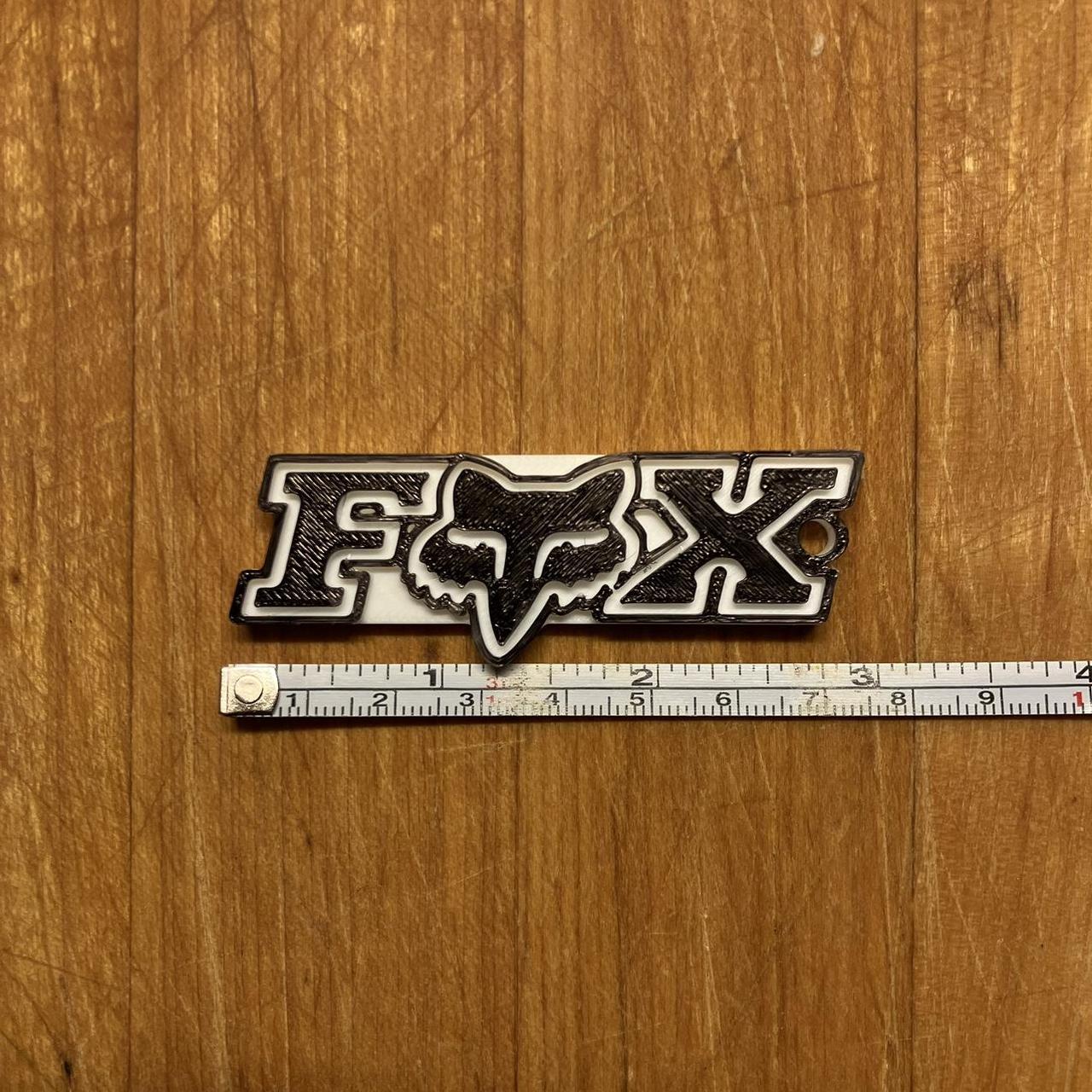 grunge fox racing keychain. super nice essential... Depop