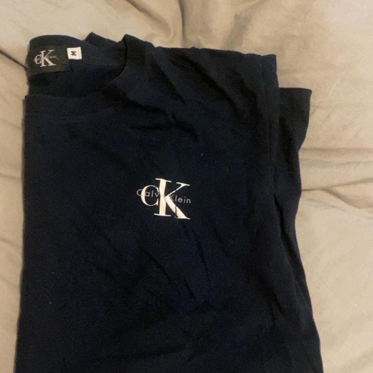 CK tee Tagged M fits like a big size small. - Depop