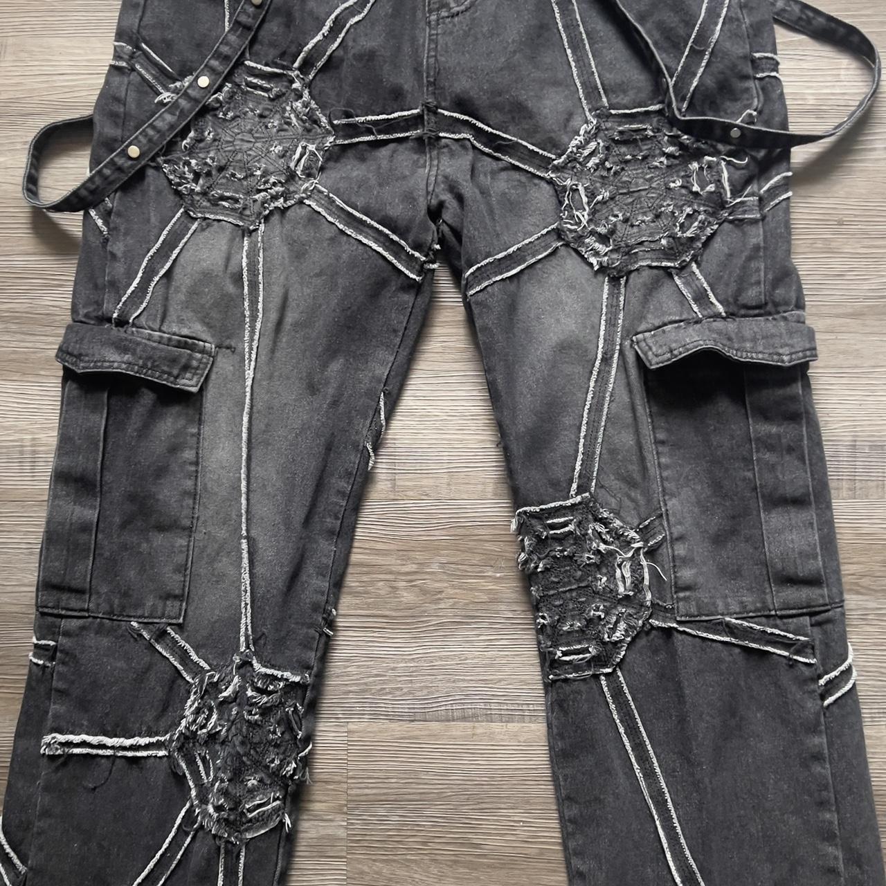 Spider web jeans with straps. Pretty baggy and a... Depop