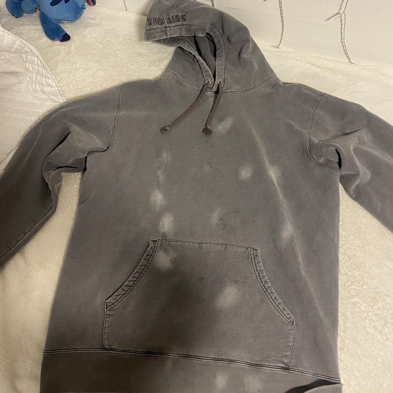 Supreme grey hoodie The only thing is the stains in... - Depop