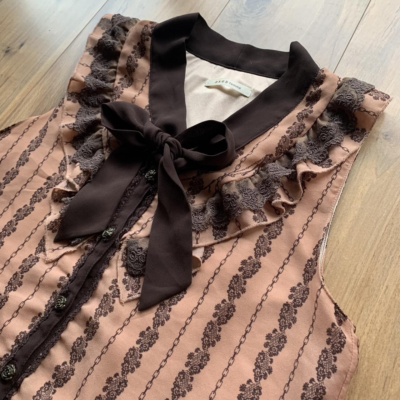 such a cute fairy tale themed Axes Femme tunic ! 🌸🍂🤍... Depop