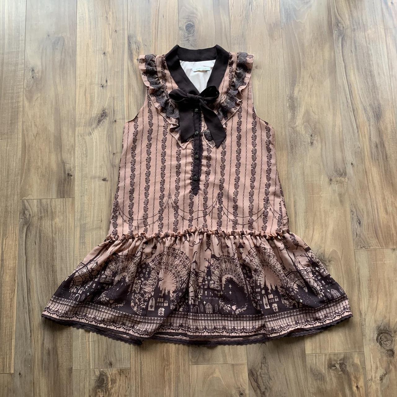 such a cute fairy tale themed Axes Femme tunic ! 🌸🍂🤍... Depop