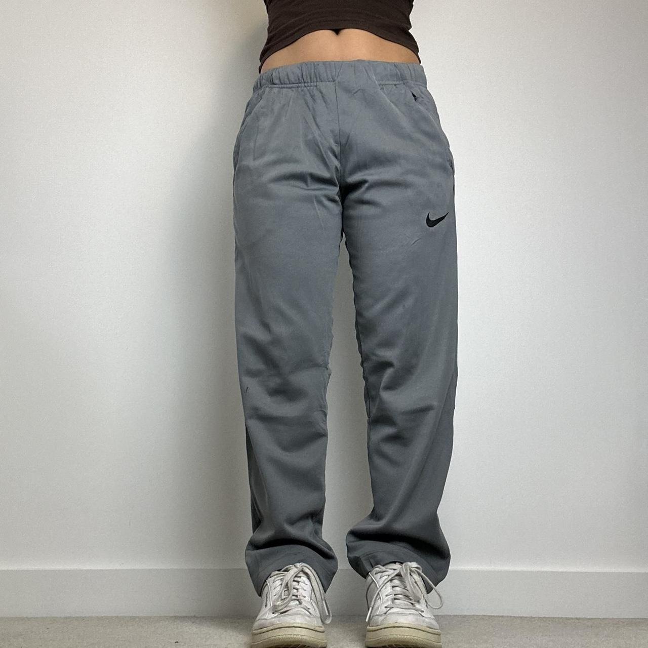 Vintage Nike grey joggers / tracksuit bottoms with... - Depop