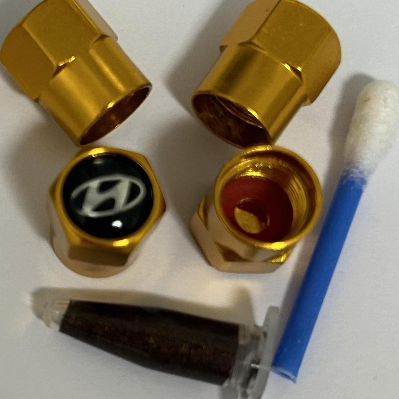 Hyundai Tyre valve caps With grease 4 X Aluminium... Depop