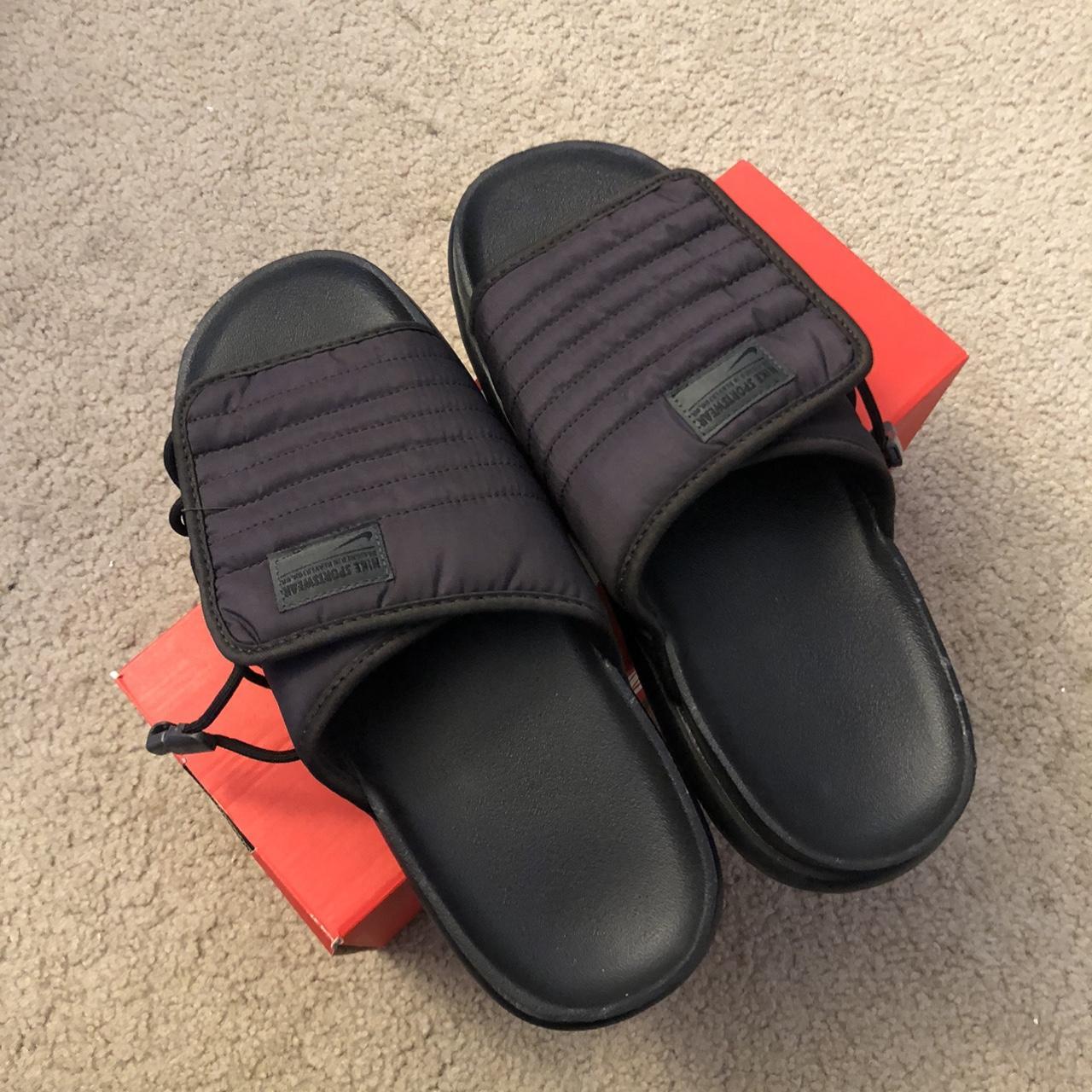 boys black nike slides
