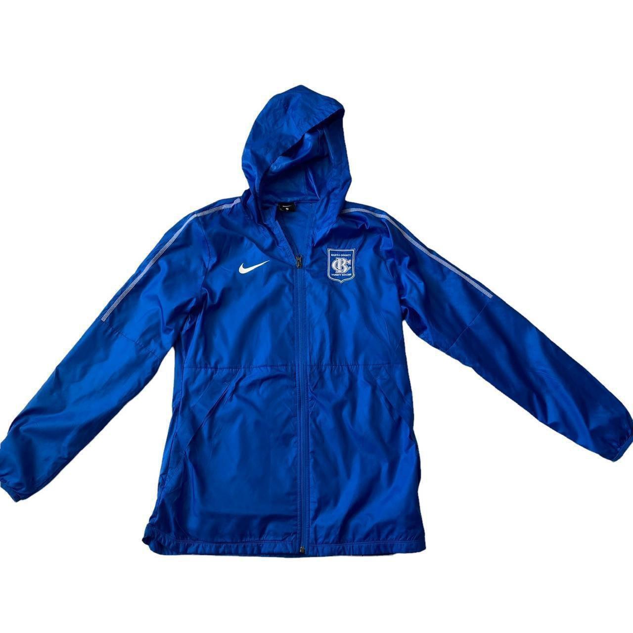 Womens Nike waterproof hooded jacket US Varsity... Depop