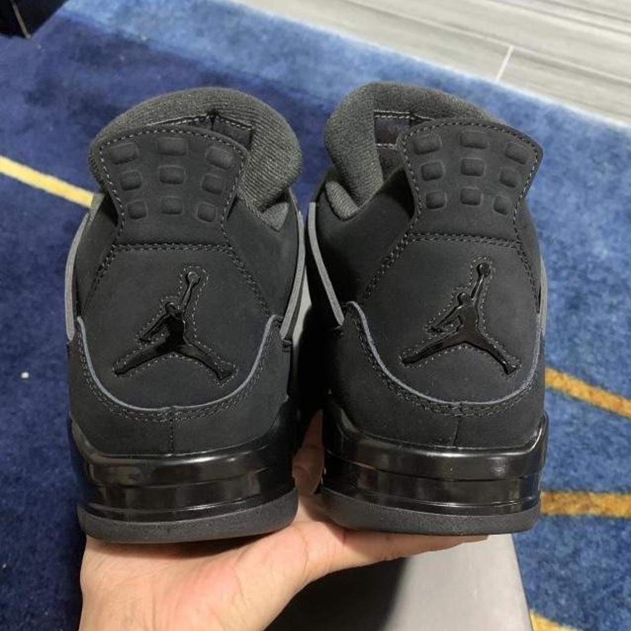 jd sports black jordans
