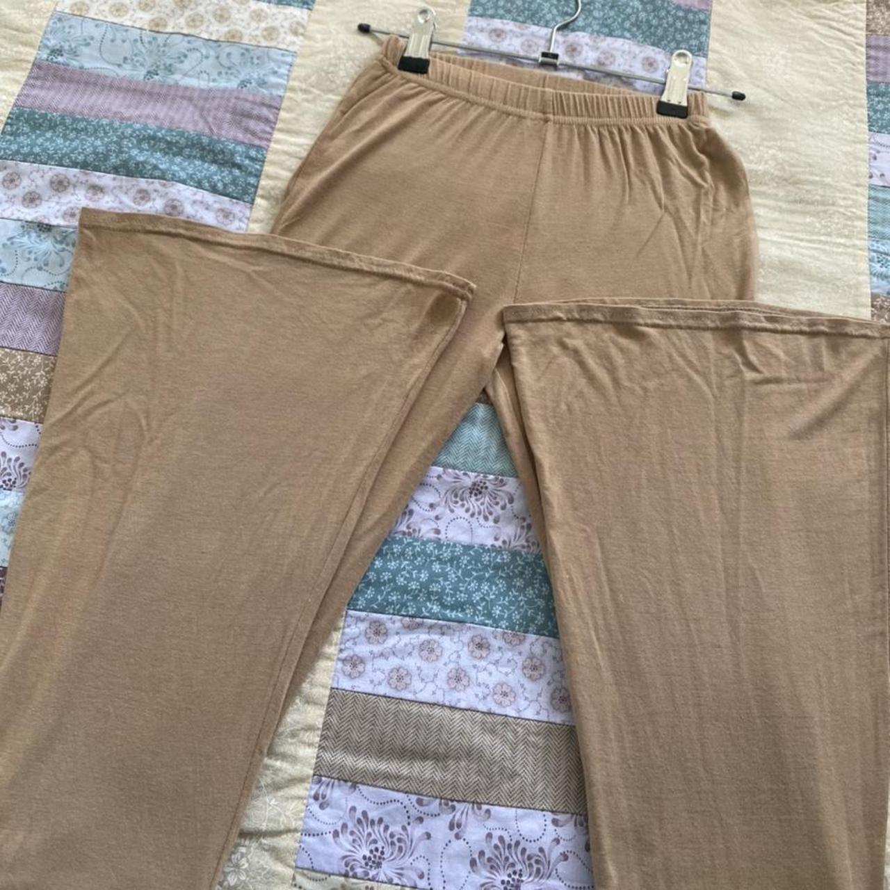 Tan beige long yoga pants with flared bottoms... - Depop