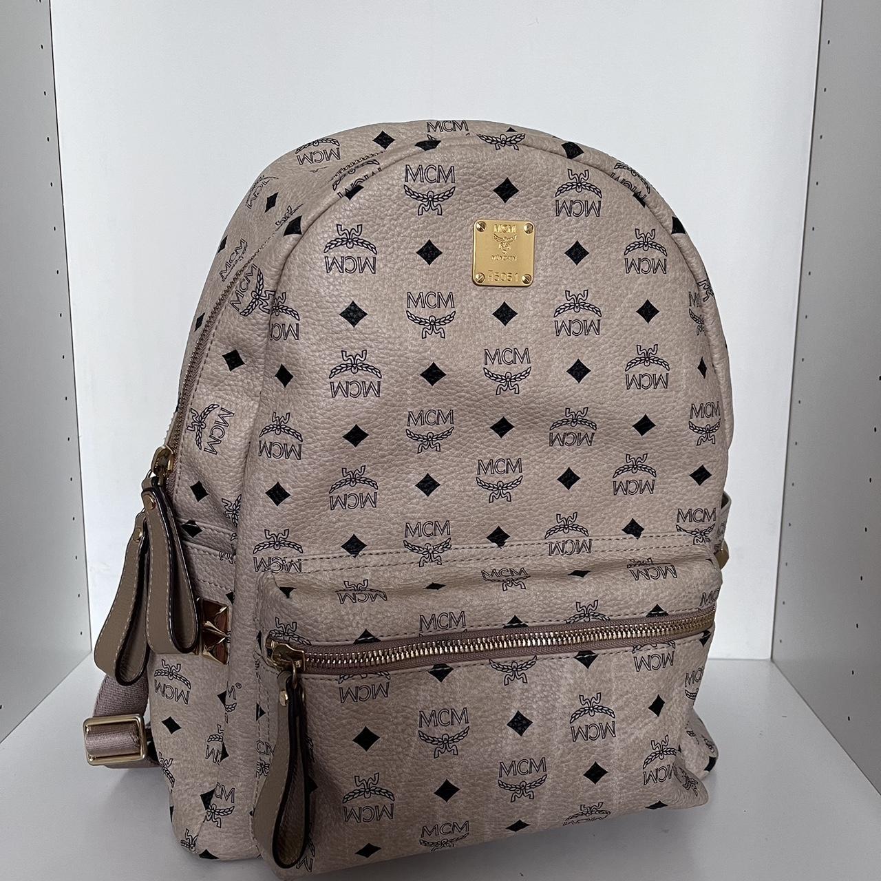 Cream mcm backpack best sale