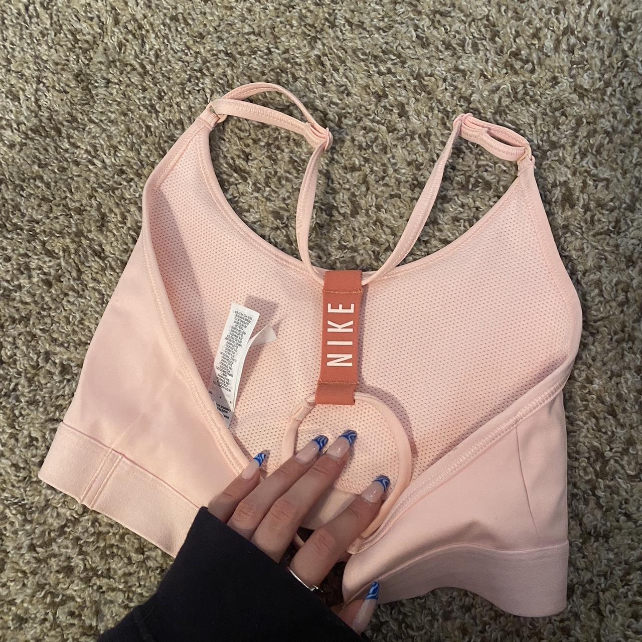 Hot pink Nike sports bra size S. Used, but good - Depop