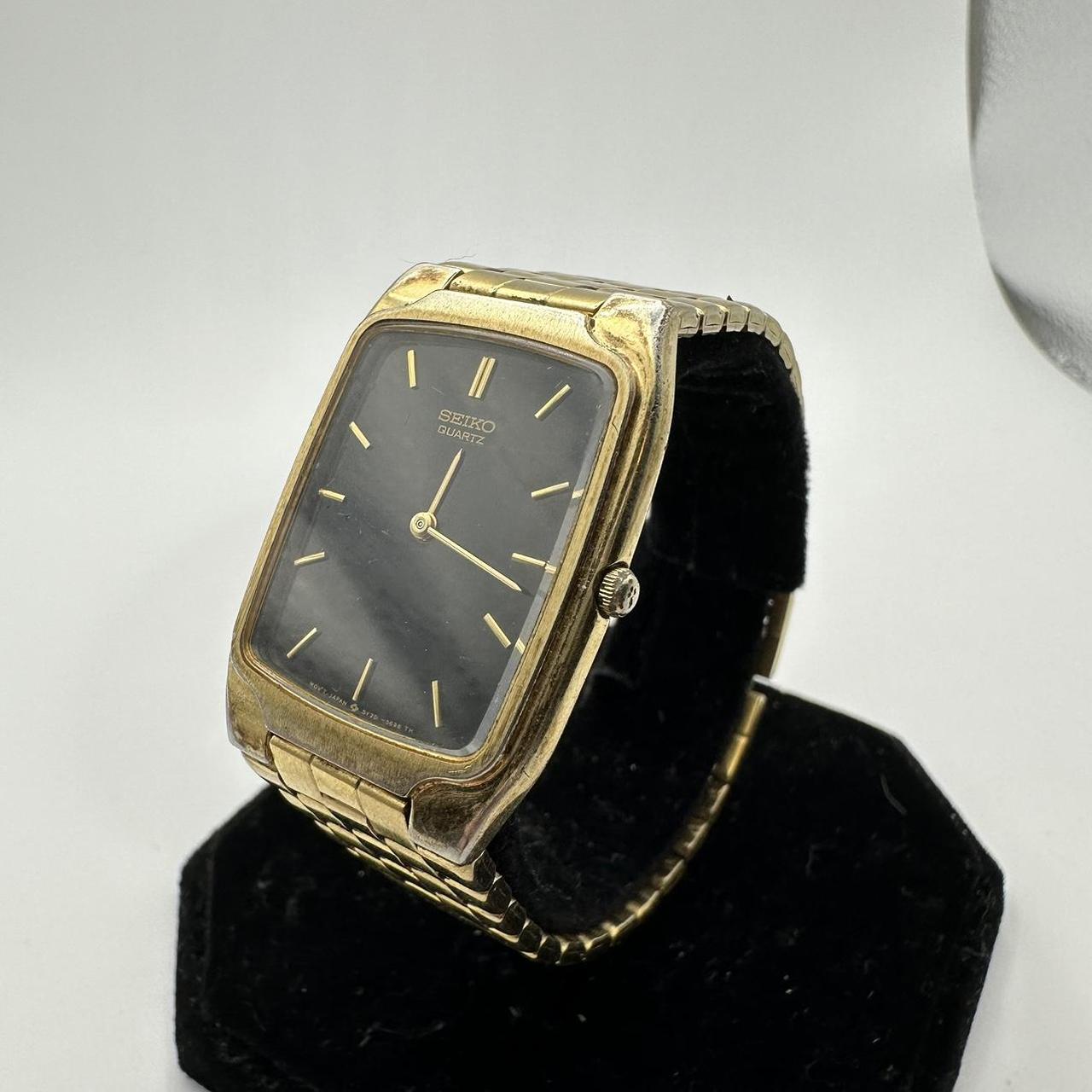 Seiko Women's Gold and Black Watch Depop