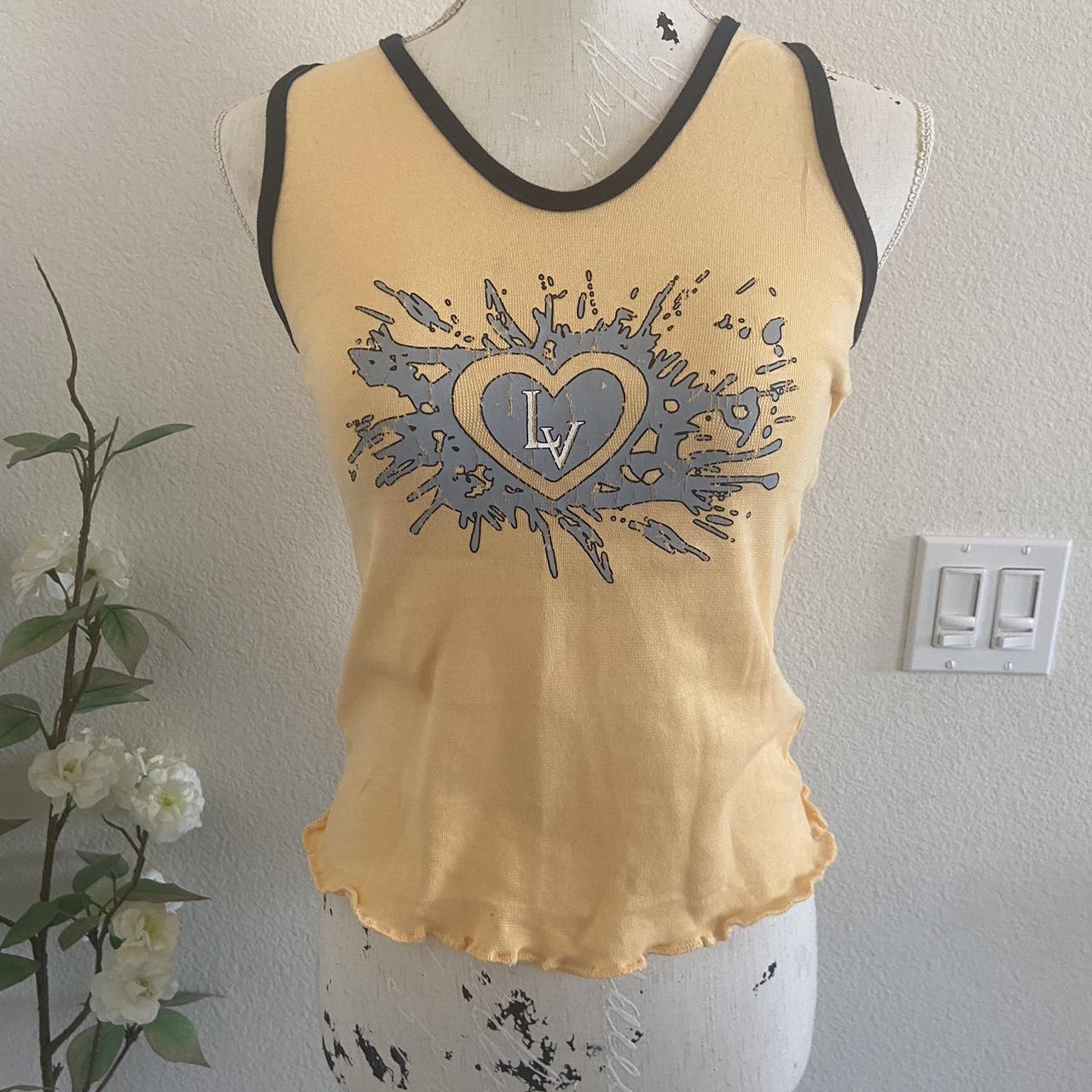 Super cute yellow and blue tank top with las vegas... - Depop