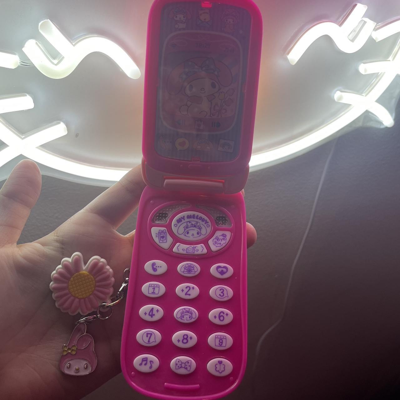 My melody toy flip phone 📞💗 The screen rotates and... - Depop