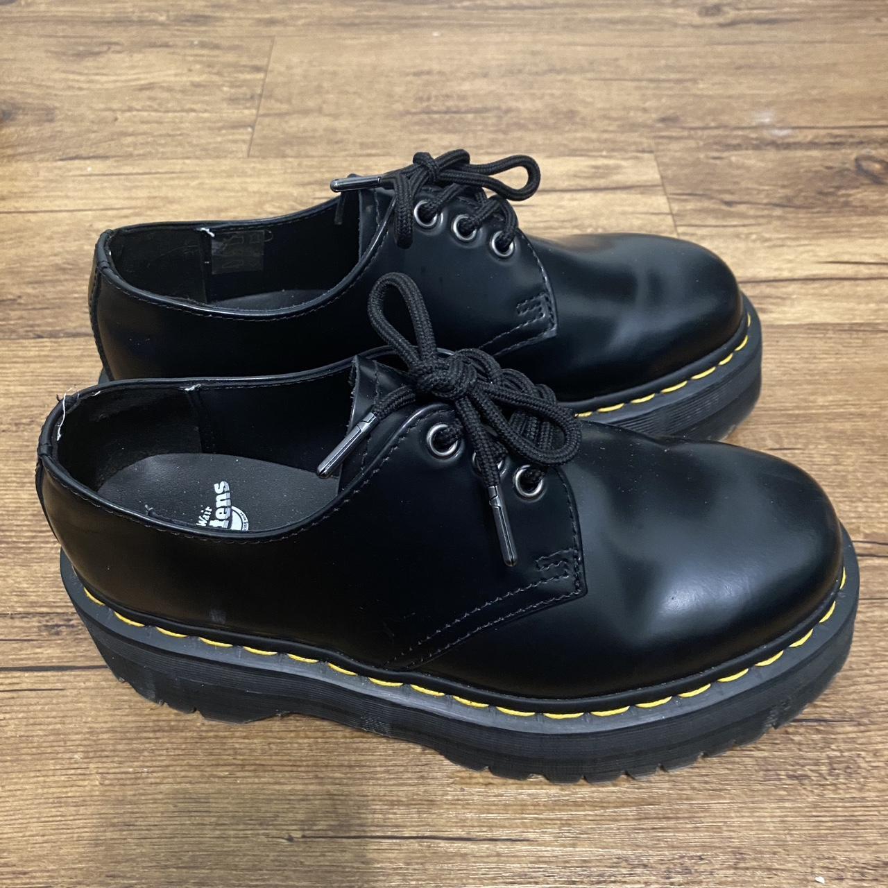 a pair of doc martens, black platform loafers in a... - Depop