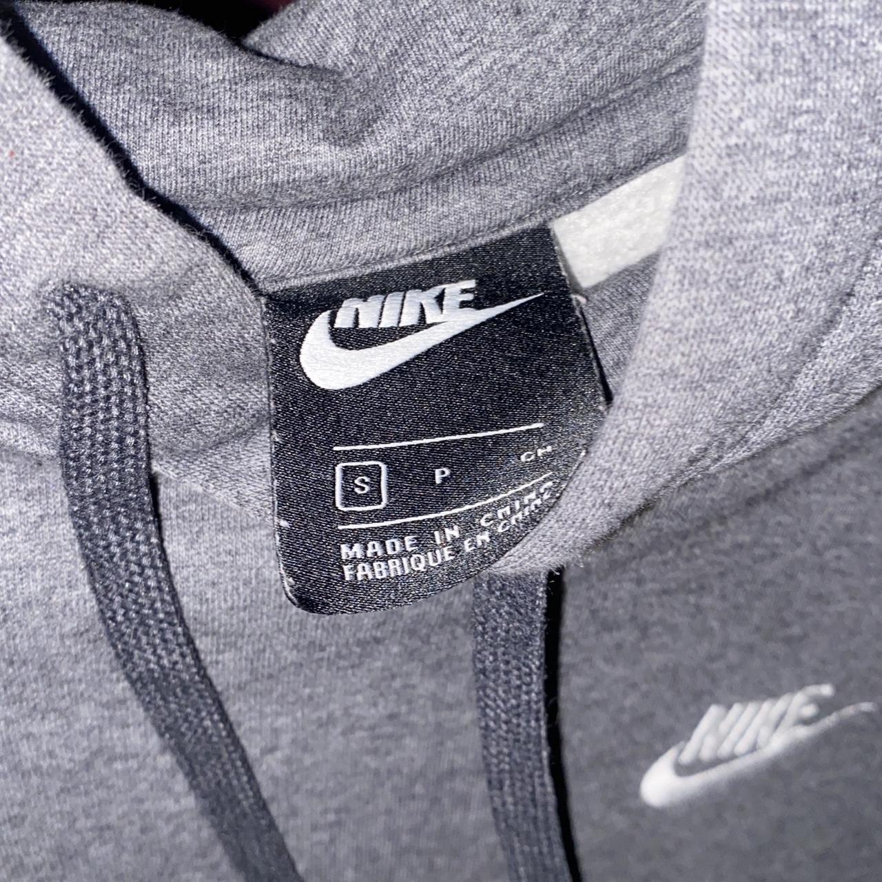 charcoal grey nike hoodie fair condition flaw: tiny... - Depop