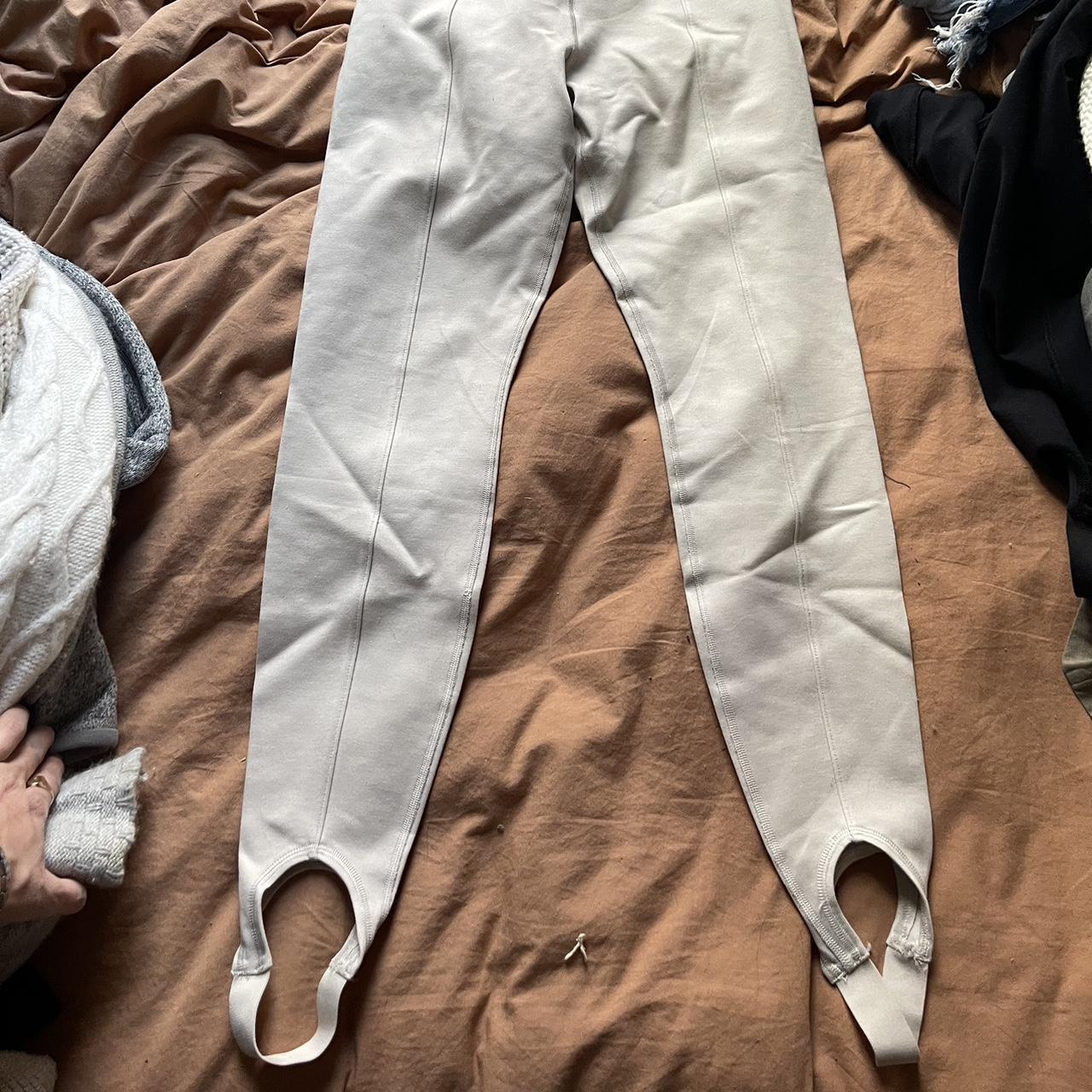 Cream colored leggings with foot loop. Super - Depop