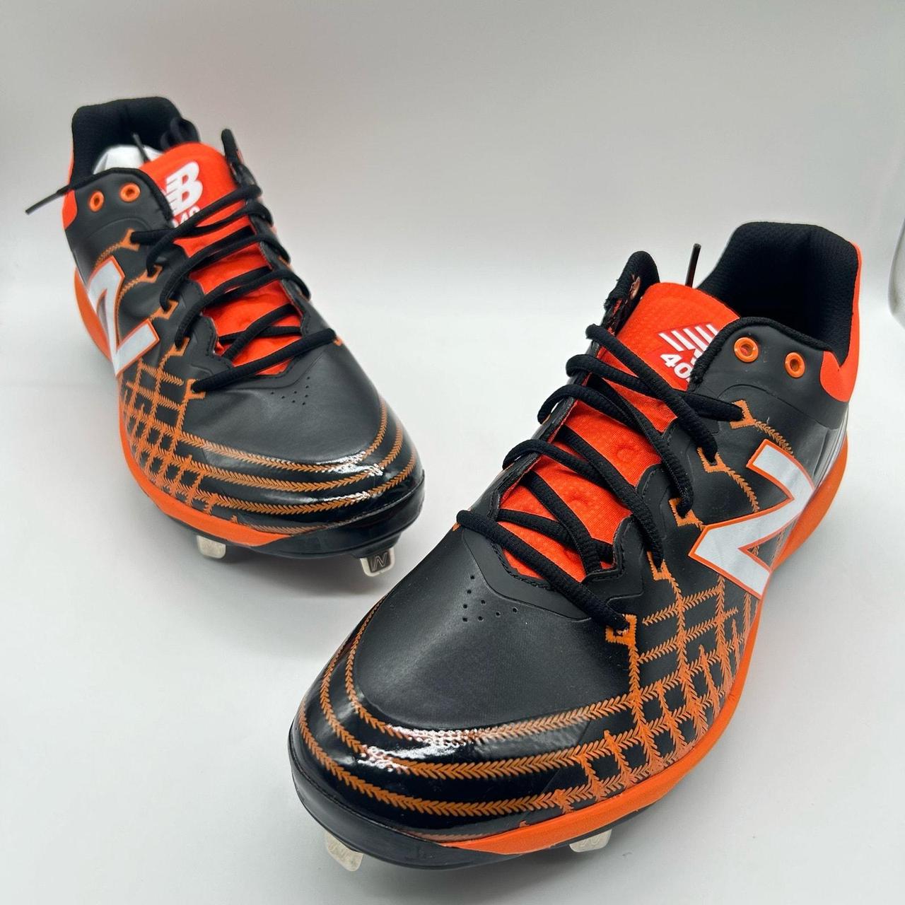 New balance baseball cleats orange and black best sale