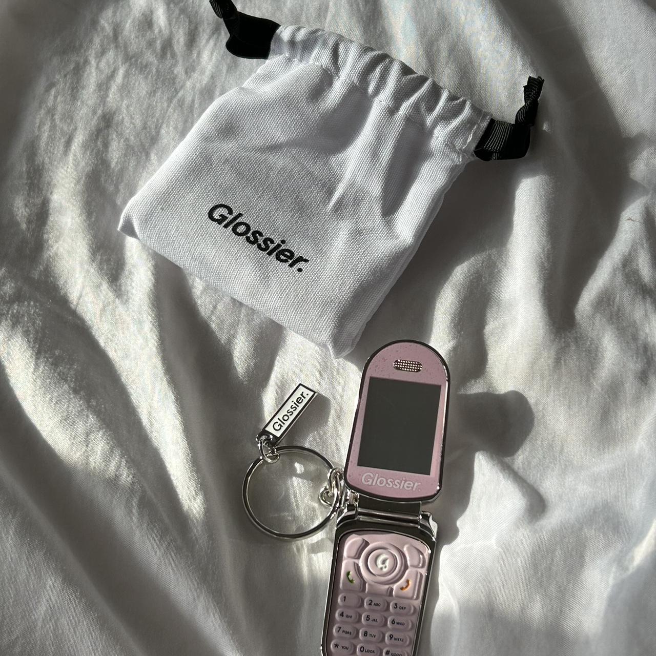 new glossier keychain. Exclusive mercy. so cute and... Depop