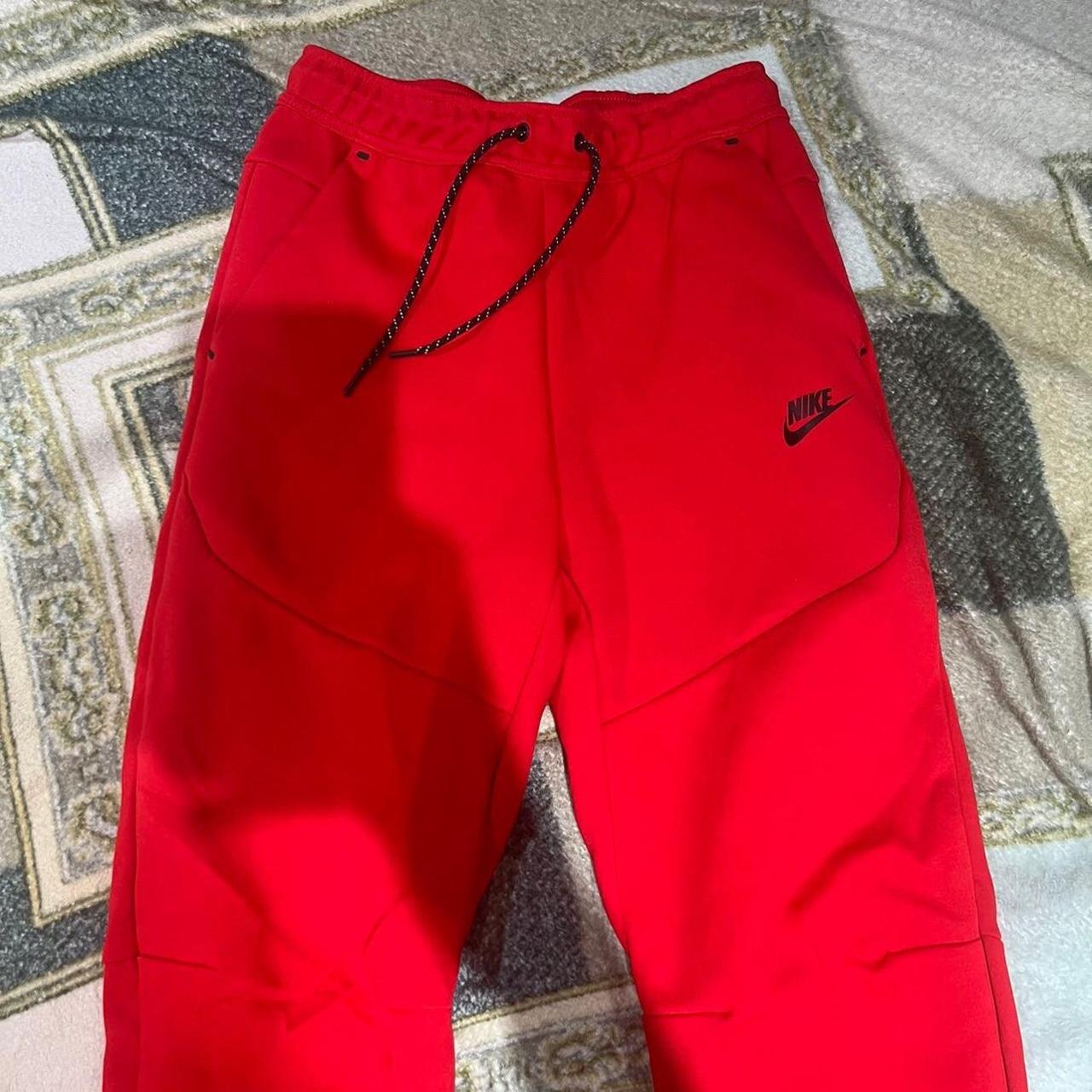 Nike Red Tech Fleece Joggers Brand new condition Size M - Depop