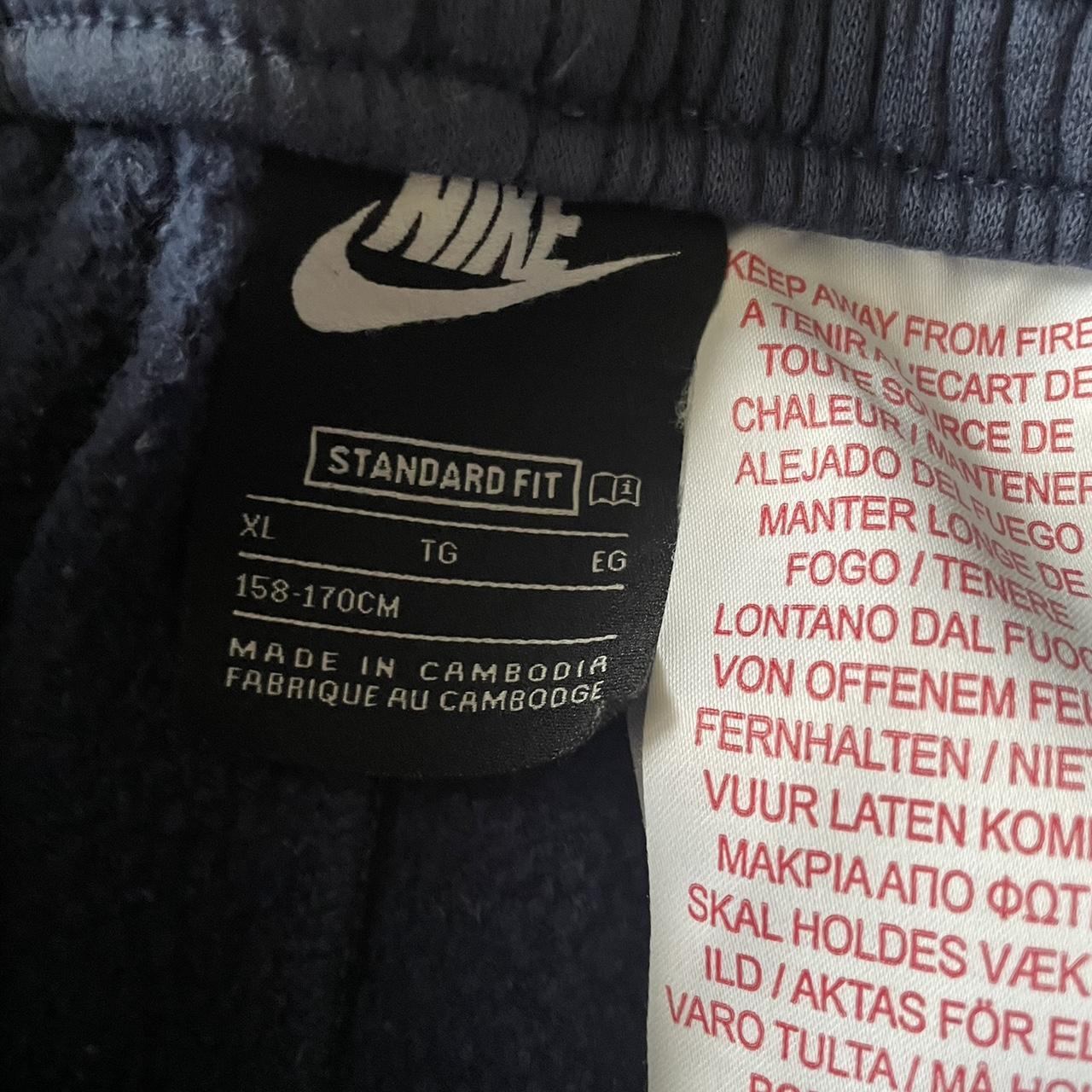 purple t shirt nike