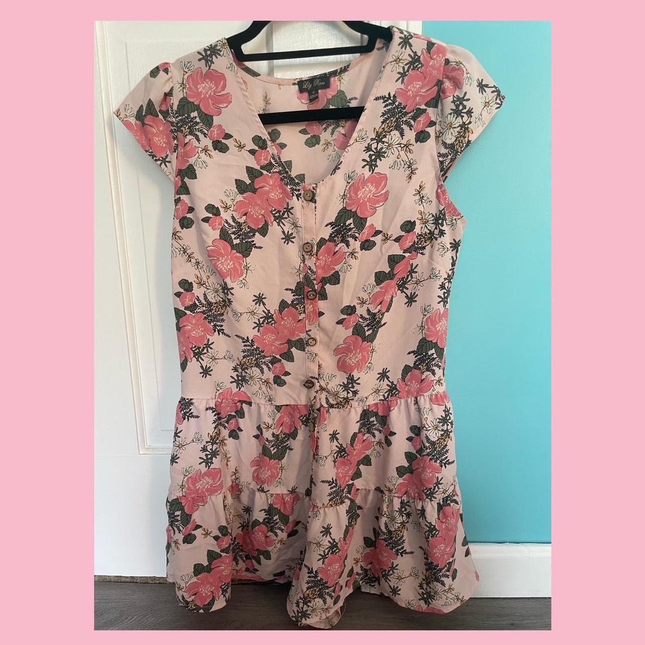 Small pink Lilly Rose romper with a floral pattern... - Depop