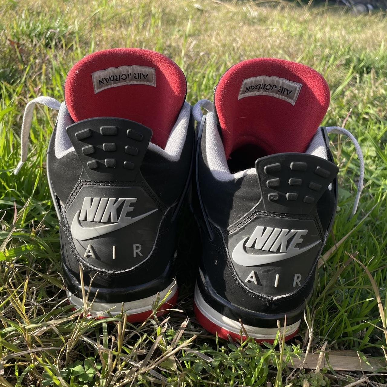 mens all black jordan 4