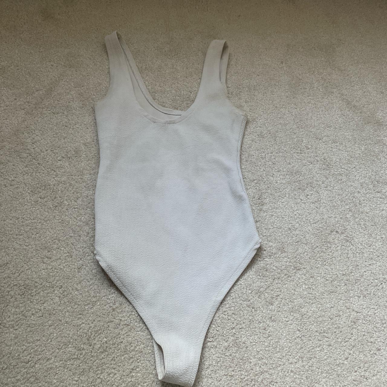 white zara bodysuit. worn well with a few marks.... - Depop