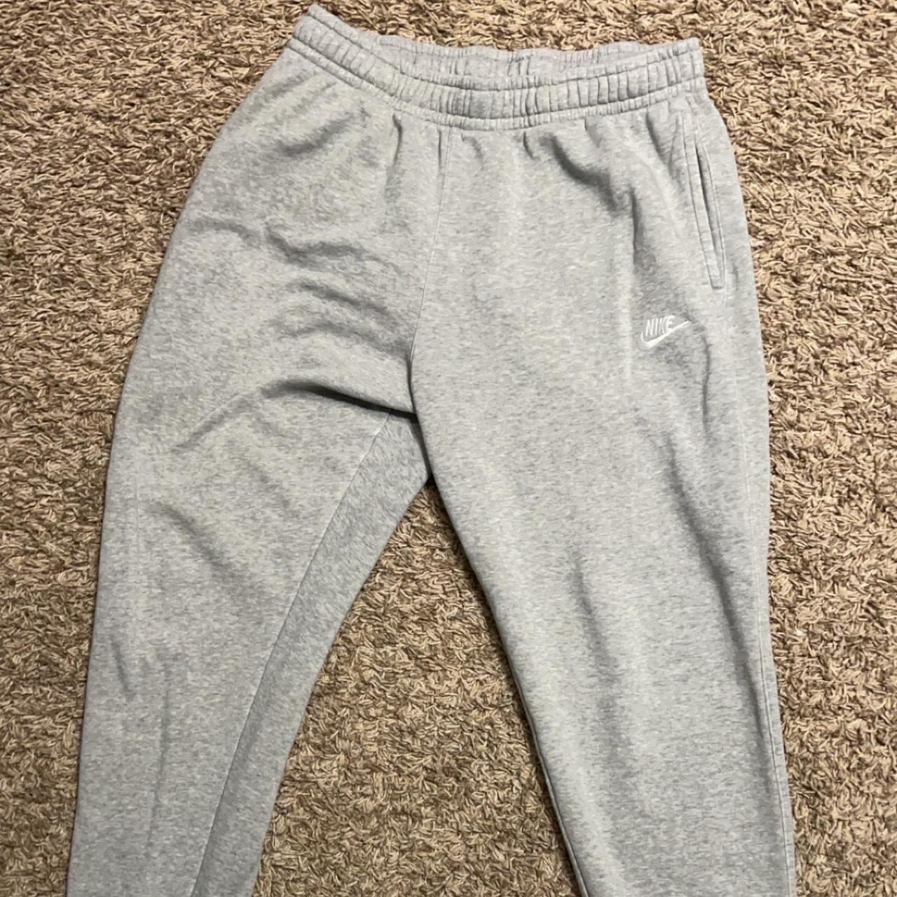 Gray Nike Pants There was a little hole on the back... - Depop