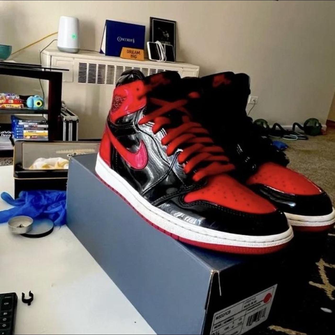 red and black camo jordans