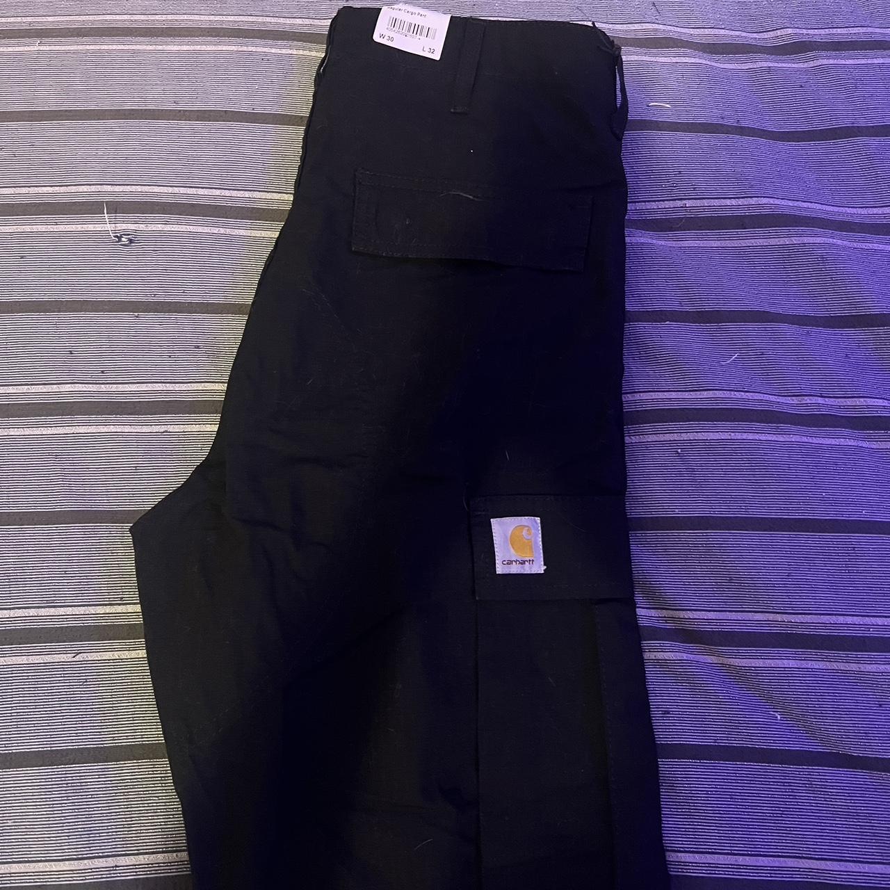 Brand New Carhartt Cargo Pants in Black. Size 30.... - Depop