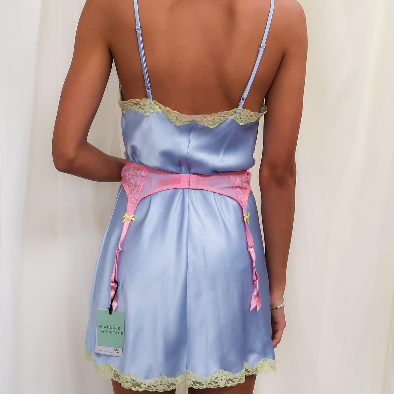 A Betsy Johnson Y2K pink and yellow garter belt from... Depop