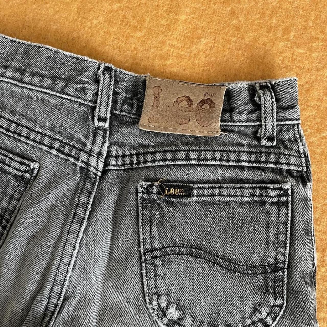 black faded wash lee jeans with button snap... - Depop