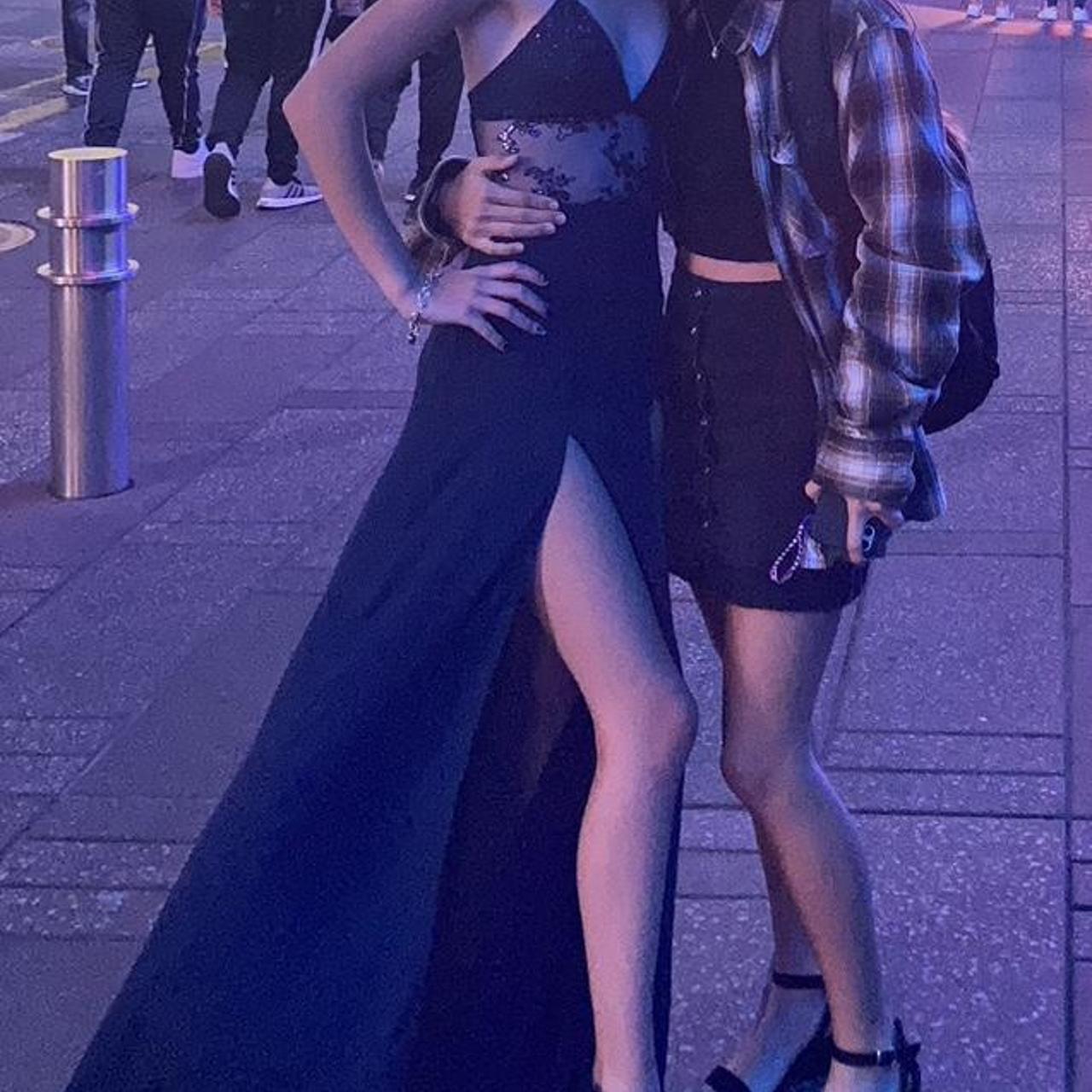 This is a blue Lucy in the sky dress. This would be... Depop