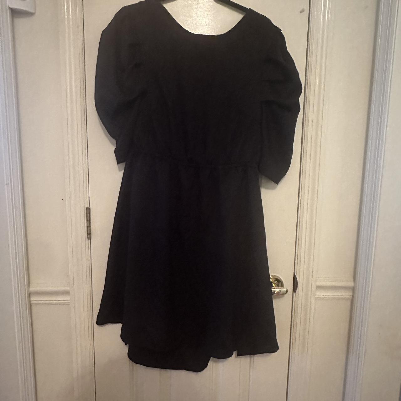 Black dress with puffy sleeves The back is cut out... - Depop