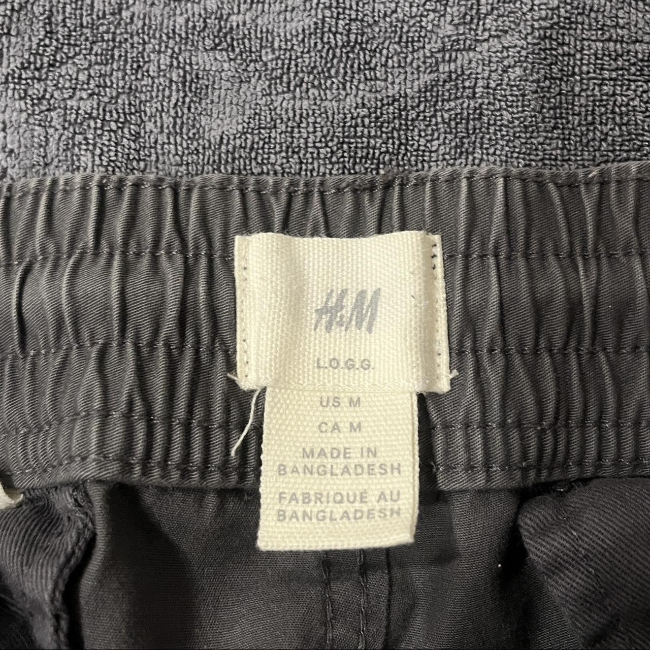 Dark grey cargos -button back pockets M - Depop