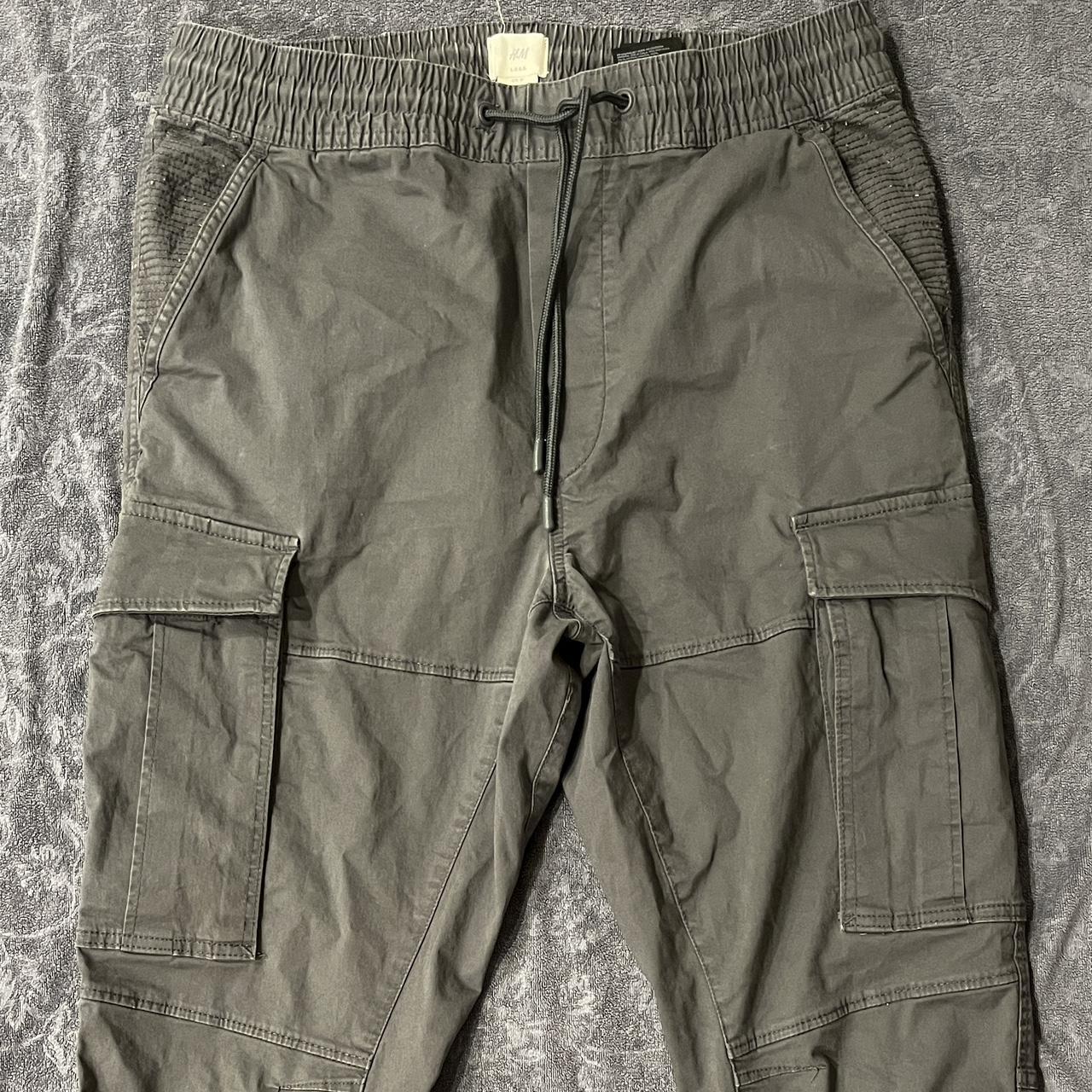 Dark grey cargos -button back pockets M - Depop