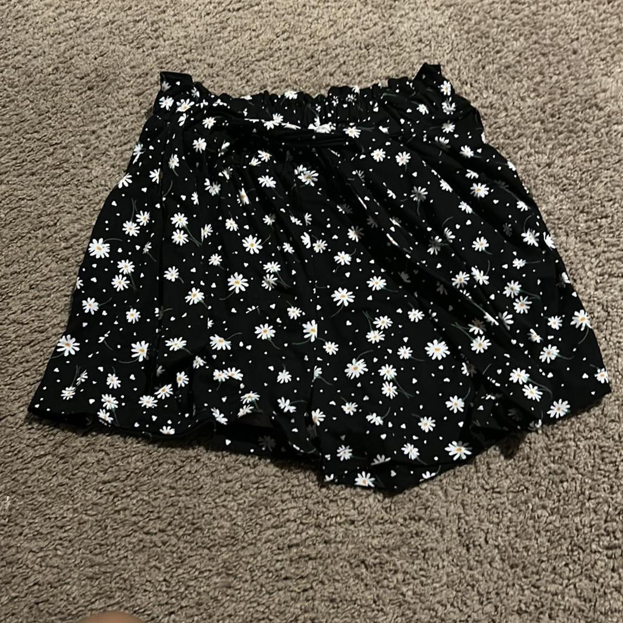 Black kids shorts with flowers in size XL - Depop