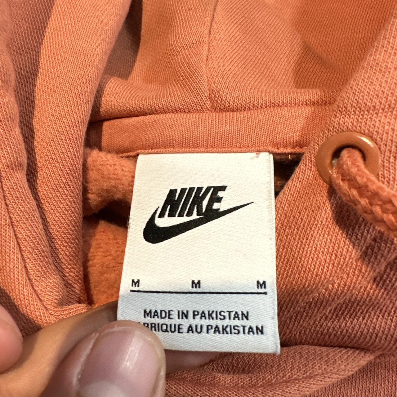 peach nike jogging suit