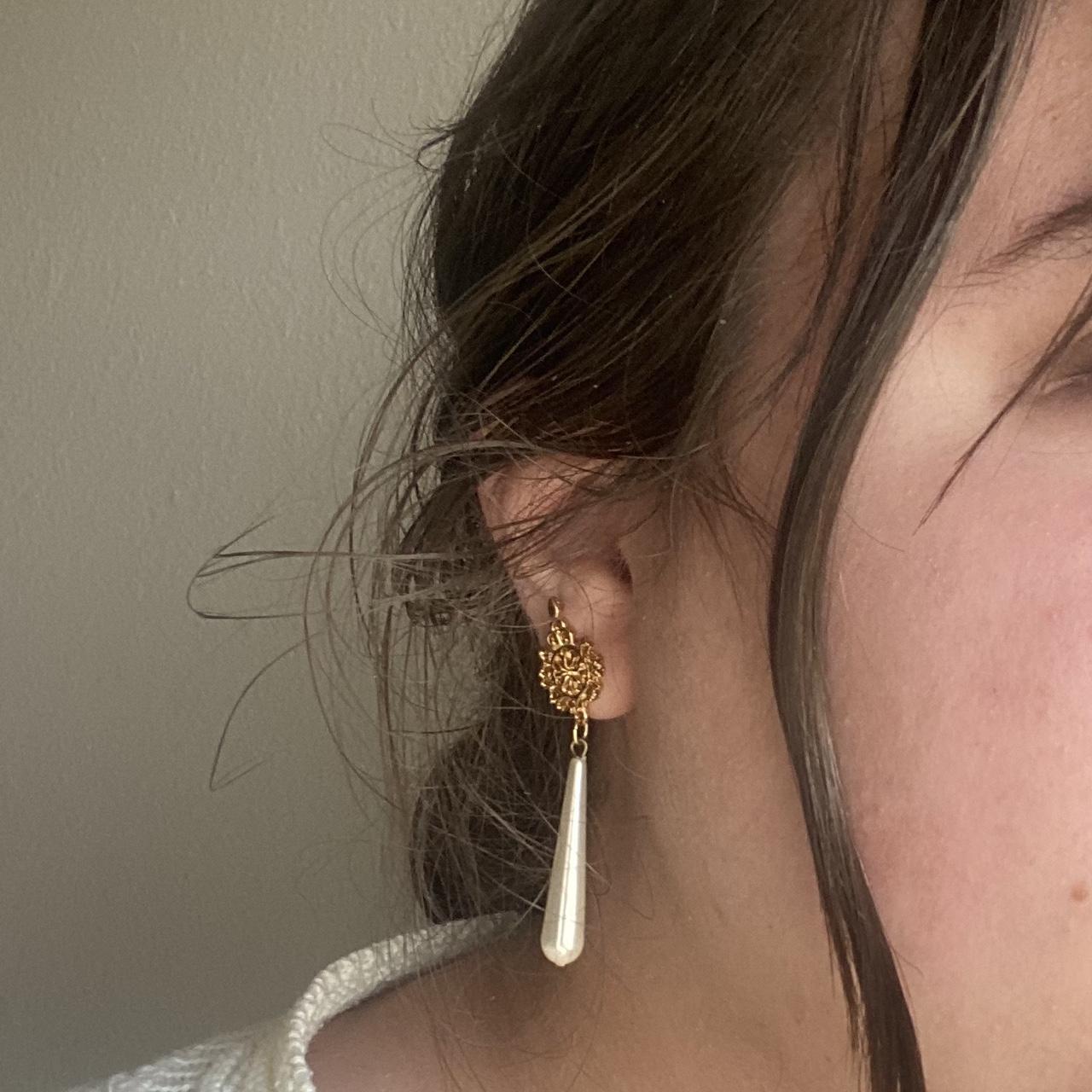 simple elegant gold earrings with a pearl bead Depop