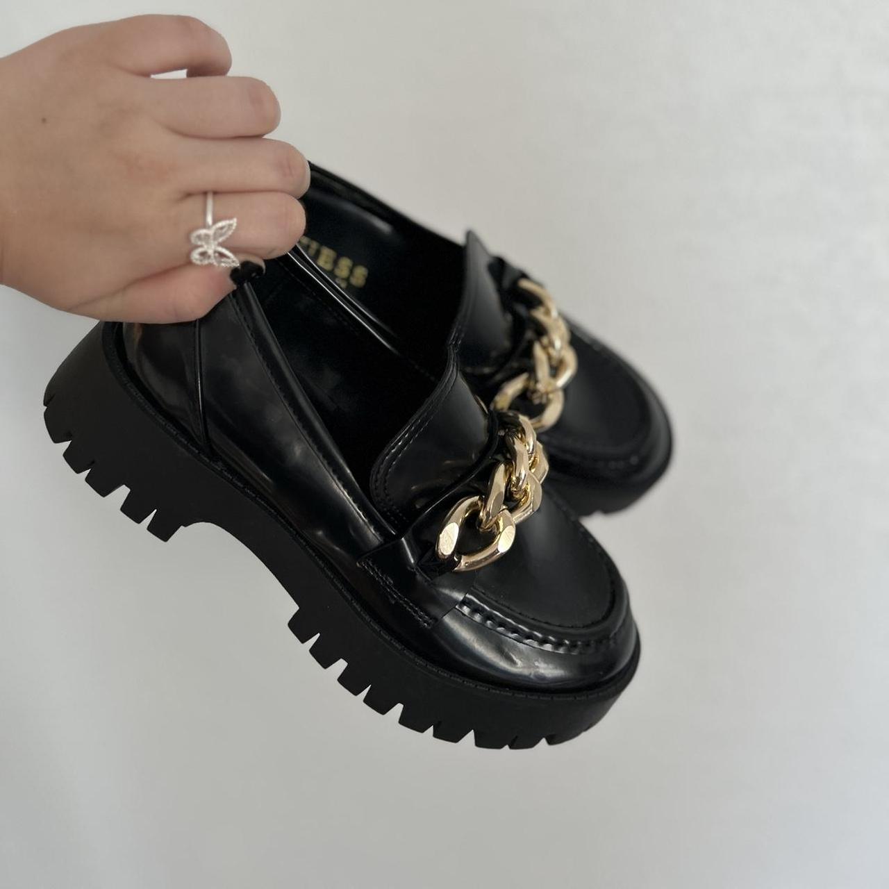 guess black sneakers with gold