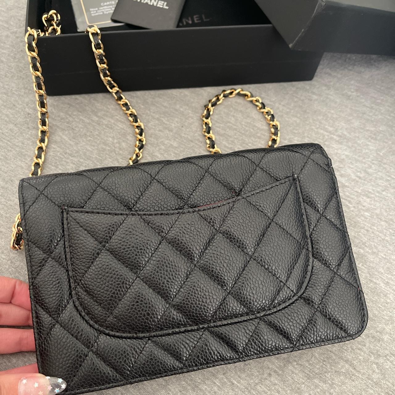 Chanel Women's Black and Gold Bag | Depop