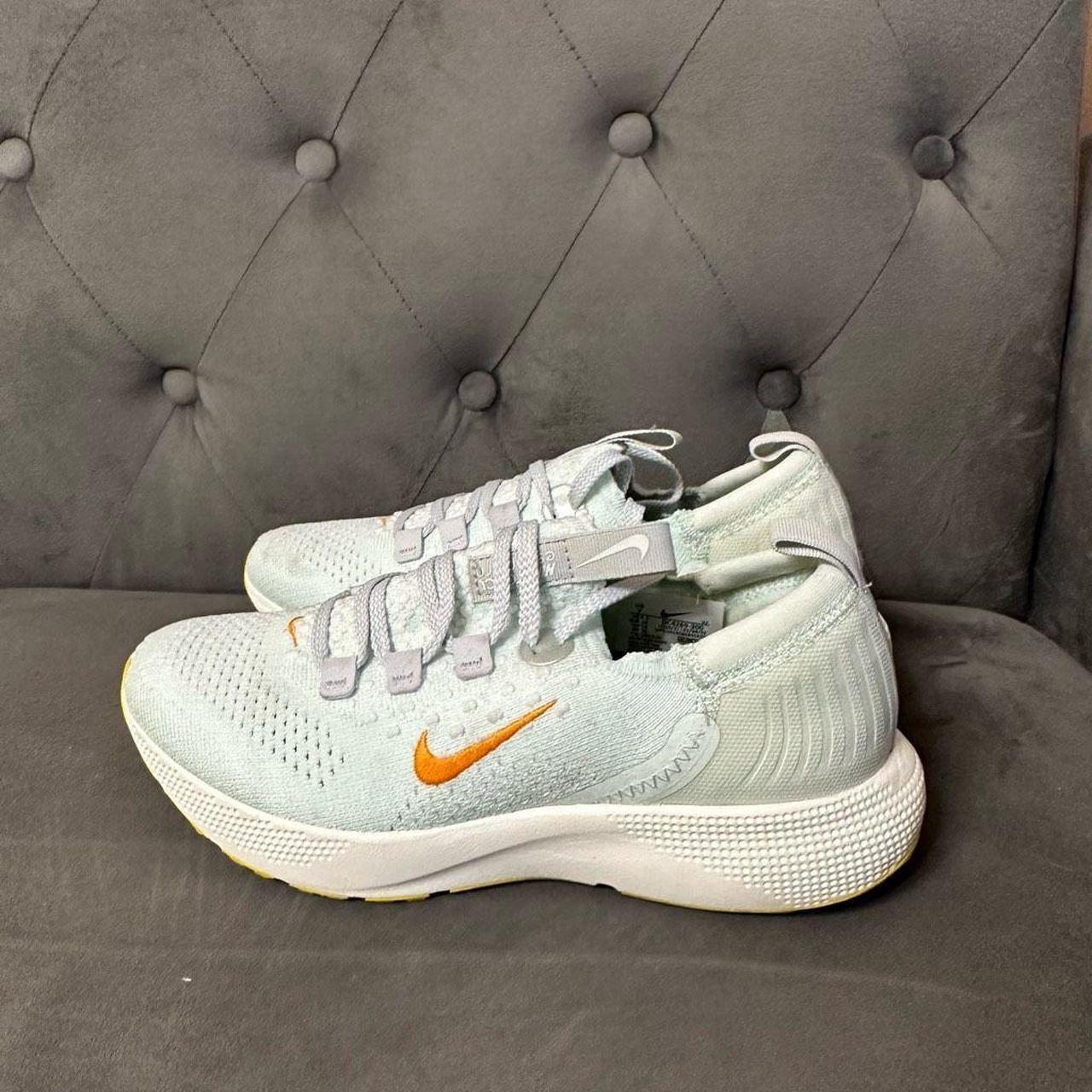 Nike Women's React Escape Run Flyknit Running Shoe - Depop