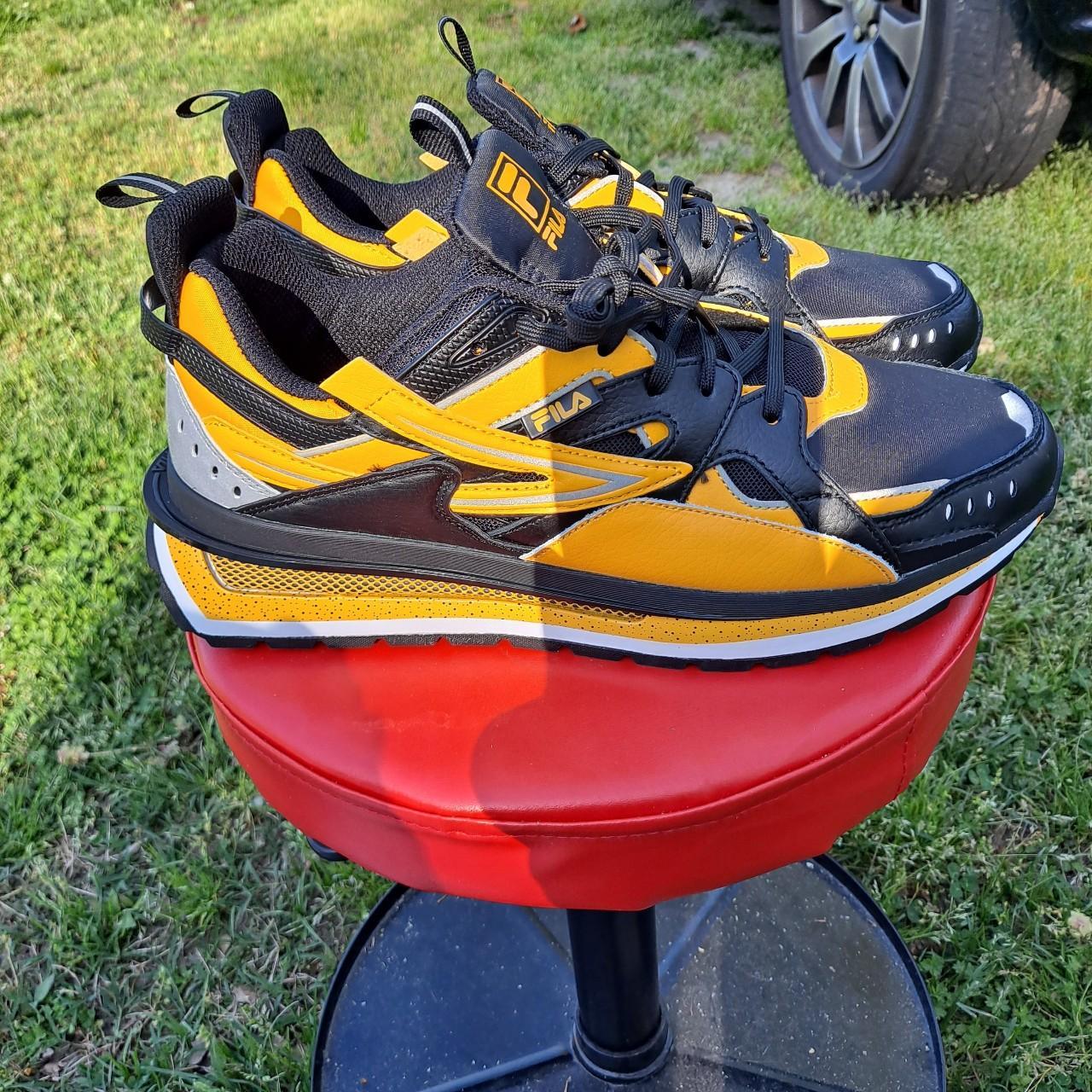 fila black and orange shoes