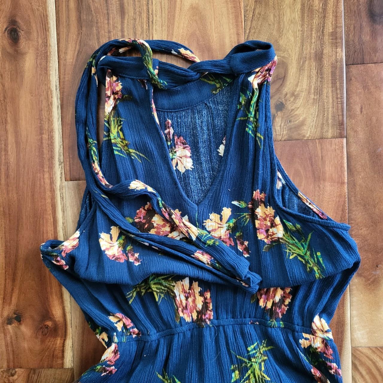 Floral neck tie dress Navy blue dress with a floral... Depop
