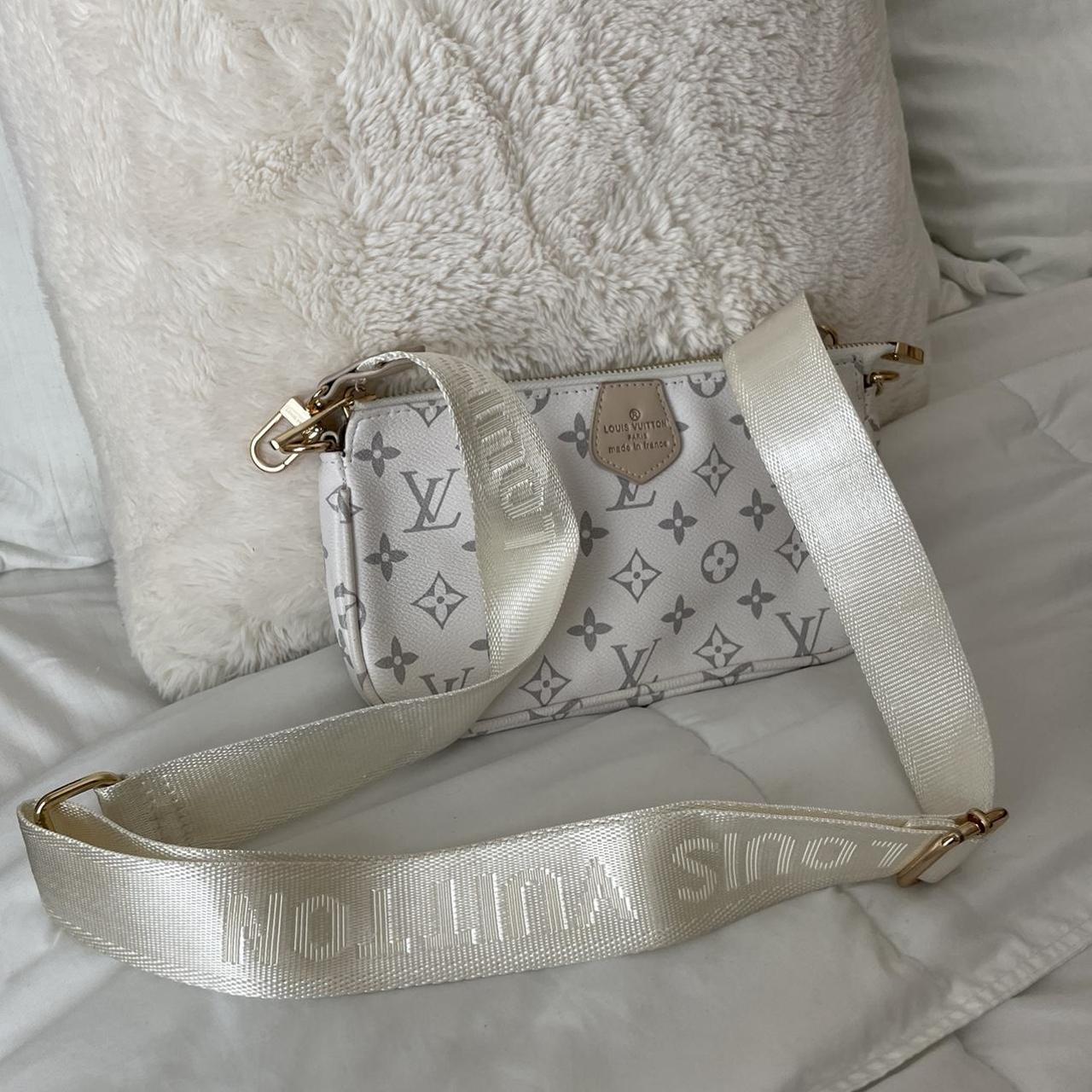 White lv bag, - comes with a small round bag that is