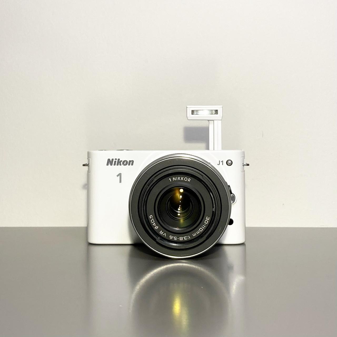 Nikon J1 Digital Camera It's in a MINT working... - Depop