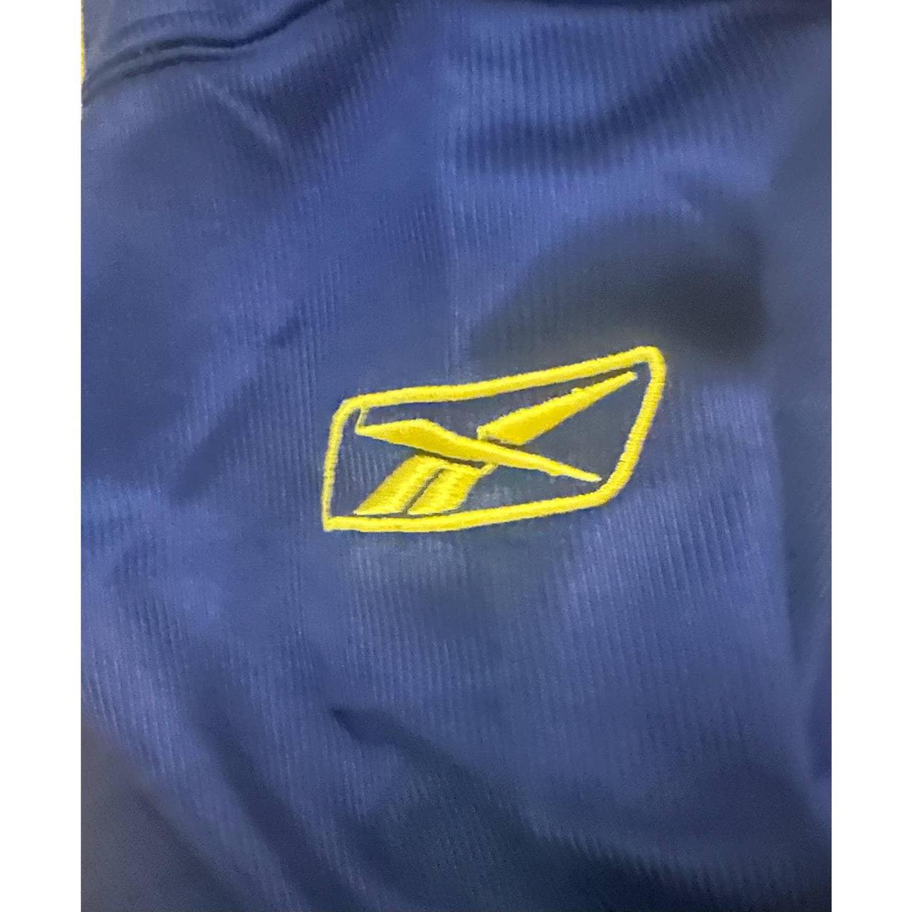 Reebok, Shirts, Acme Packers Blue Tshirt